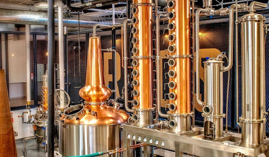 What does distillation equipment in a brewery consist of?